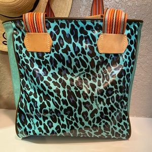 Selling this teal/blue glitter Consuela to…